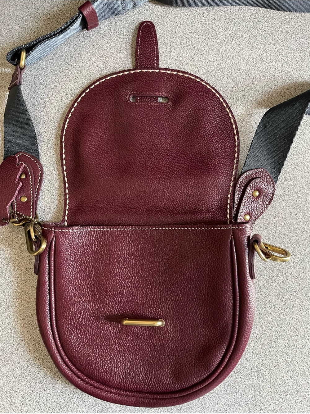 Roots  Leather Saddle Crossbody Bag in Deep Plum - Picture 8 of 14